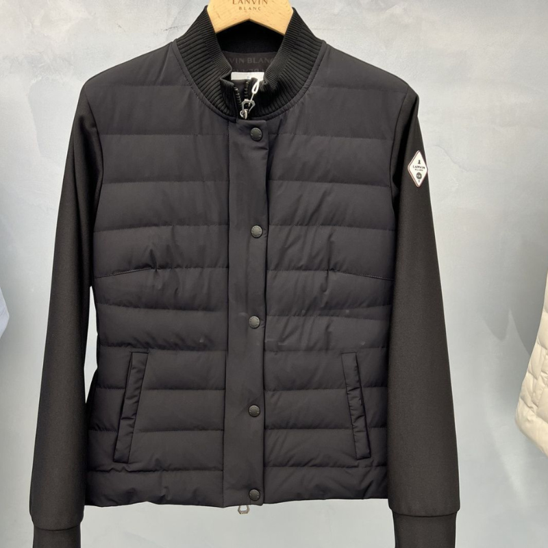 Women wearing lightweight golf jackets on golf course in Australia Women wearing lightweight golf jackets on golf course in Australia